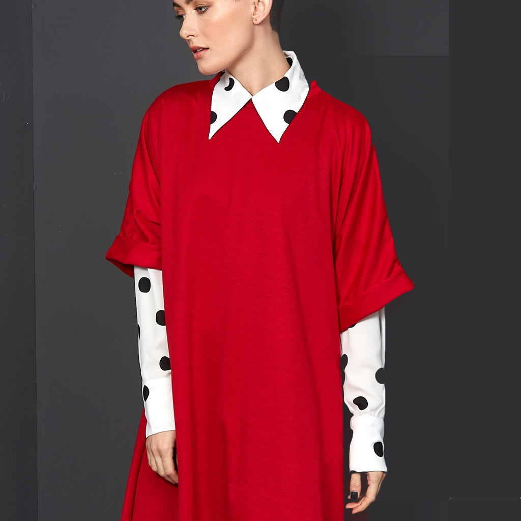 red dress flared being worn by dark haired lady